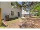 View of the home's backyard with AC unit, patio, and a fenced boundary at 3425 Sable Chase Ln, South Fulton, GA 30349