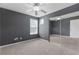 A carpeted bedroom has a mirrored closet, natural light and neutral decor at 3425 Sable Chase Ln, South Fulton, GA 30349