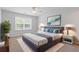 A primary bedroom showcases a plush bed with decorative pillows and stylish furnishings at 3425 Sable Chase Ln, South Fulton, GA 30349