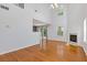 Spacious living room featuring hardwood floors, a fireplace, and sliding glass doors to the outside at 3425 Sable Chase Ln, South Fulton, GA 30349