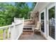 A spacious outdoor deck area perfect for entertaining or relaxing in nature at 486 Buttercup Trl, Lawrenceville, GA 30046