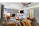 Comfortable living room featuring a fireplace, sofa, and access to a patio door at 486 Buttercup Trl, Lawrenceville, GA 30046