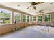 Bright sunroom featuring lots of natural lighting from the many windows at 486 Buttercup Trl, Lawrenceville, GA 30046