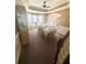 Traditional dining room with light tan walls, bay windows, and a table set for six at 7625 Cedar Grove Ct, Fairburn, GA 30213
