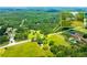 Aerial view of a house in a lush area showcasing the surrounding landscape at 1730 Lee Peters Rd, Loganville, GA 30052