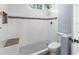 Tiled shower and a built-in seat at 1730 Lee Peters Rd, Loganville, GA 30052
