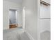 Hallway area with closet on the right, carpet floors, and neutral wall paint at 1730 Lee Peters Rd, Loganville, GA 30052
