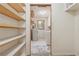 Bright laundry room with a water heater and a washing machine at 1926 Parkwood Rd, Snellville, GA 30078