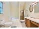 Well-lit bathroom featuring a shower, jacuzzi-style tub, and vanity with a sink at 2715 Braemore Gln, Powder Springs, GA 30127