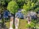 Aerial view of the property with a long driveway and a large, lush lawn at 2903 Monterey Dr, Decatur, GA 30032