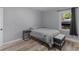 This bedroom features a simple design with hardwood floors and natural light at 2903 Monterey Dr, Decatur, GA 30032