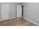 Spacious bedroom featuring wood floors and closet at 2903 Monterey Dr, Decatur, GA 30032