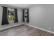 Bright bedroom with wood floors and large windows at 2903 Monterey Dr, Decatur, GA 30032