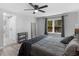Comfortable bedroom features barn door, neutral colors and natural light at 2903 Monterey Dr, Decatur, GA 30032