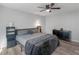 Cozy bedroom featuring ceiling fan and a view of the surrounding trees at 2903 Monterey Dr, Decatur, GA 30032