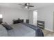 This bedroom features barn door, neutral colors and ceiling fan at 2903 Monterey Dr, Decatur, GA 30032