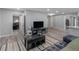 Open living room with modern floors and neutral paint and views of other rooms at 2903 Monterey Dr, Decatur, GA 30032