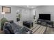 Comfortable living room with a contemporary rug and media center at 2903 Monterey Dr, Decatur, GA 30032