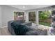 Comfortable living room with large windows and a backyard view at 2903 Monterey Dr, Decatur, GA 30032