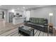 Open-concept living space with the kitchen in the background at 2903 Monterey Dr, Decatur, GA 30032