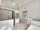 Bright bathroom with separate tub, shower, and vanity at 3832 Cherry Ridge Blvd, Decatur, GA 30034