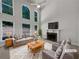 Bright living room with fireplace, high ceilings, and plenty of natural light at 3832 Cherry Ridge Blvd, Decatur, GA 30034