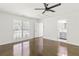 Bright main bedroom featuring polished concrete floors and an ensuite bathroom with bright, natural light at 762 Rockbridge Nw Rd, Lilburn, GA 30047