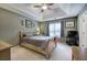 Comfortable bedroom with vaulted ceilings, a cozy bed, and a window for natural light at 1047 Taso Trl, Acworth, GA 30101