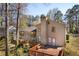 An exterior shot of the backyard featuring a spacious deck perfect for entertaining and outdoor enjoyment at 1312 Brandl Dr, Marietta, GA 30008