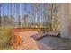 Spacious wood deck is perfect for outdoor entertaining and overlooks a wooded area at 1312 Brandl Dr, Marietta, GA 30008