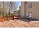 Spacious wood deck is perfect for outdoor entertaining and overlooks a wooded area at 1312 Brandl Dr, Marietta, GA 30008