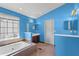 Bright bathroom features a large soaking tub, vanity with dark wood cabinets, and neutral tile flooring at 1312 Brandl Dr, Marietta, GA 30008