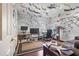 Hobby room featuring hardwood floors and walls covered with airplane models at 1312 Brandl Dr, Marietta, GA 30008