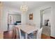 Cozy dining room adjacent to the living room, highlighted by a chandelier and decorative furniture at 1312 Brandl Dr, Marietta, GA 30008