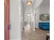 Bright entryway with wood-look tile flooring, leading to a dining area and living space at 1312 Brandl Dr, Marietta, GA 30008