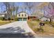 Charming two-story home with a two-car garage, front porch, and well-maintained lawn at 1312 Brandl Dr, Marietta, GA 30008