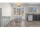 Bright eat-in kitchen with granite countertops and large windows overlooking the trees at 1312 Brandl Dr, Marietta, GA 30008
