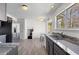 Open kitchen with stainless steel appliances, granite countertops, and tile floors at 1312 Brandl Dr, Marietta, GA 30008