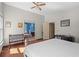 Main bedroom with wood floors and ensuite bathroom at 1312 Brandl Dr, Marietta, GA 30008