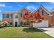 Charming brick two-story home with manicured lawn and mature landscaping, perfect for curb appeal at 2372 Oberon Se Walk, Smyrna, GA 30080