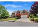 Charming two-story brick home featuring well-maintained landscaping, a spacious driveway and an attached two-car garage at 2372 Oberon Se Walk, Smyrna, GA 30080