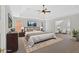 Serene primary bedroom with a tray ceiling, neutral decor, and a relaxing ambiance for peaceful nights at 2372 Oberon Se Walk, Smyrna, GA 30080