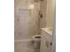 Modern bathroom features marble-patterned walls, walk-in shower, and a sleek vanity at 4220 Glad Morning Dr, College Park, GA 30349