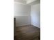 Bedroom with light-colored walls and modern flooring at 4220 Glad Morning Dr, College Park, GA 30349