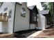 Beautiful two-story house with an amazing architectural design and an elevated wooden porch at 4220 Glad Morning Dr, College Park, GA 30349