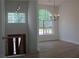 Elegant foyer featuring a staircase, high ceiling, and modern chandeliers at 4220 Glad Morning Dr, College Park, GA 30349