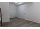 Clean, unfinished room with neutral paint and wood-look flooring at 4220 Glad Morning Dr, College Park, GA 30349