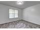 Bedroom featuring neutral colors and neutral carpet at 476 Cody Ln, Douglasville, GA 30134