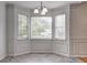 Dining area with three windows providing natural light and architectural detail at 476 Cody Ln, Douglasville, GA 30134