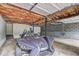 Spacious garage with high ceilings, exposed insulation, and a unique three-wheeled vehicle at 476 Cody Ln, Douglasville, GA 30134